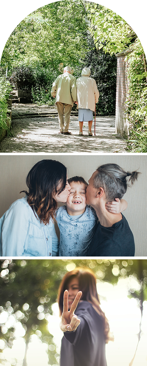 elderly couple walking parents kissing their male child woman giving piece sign